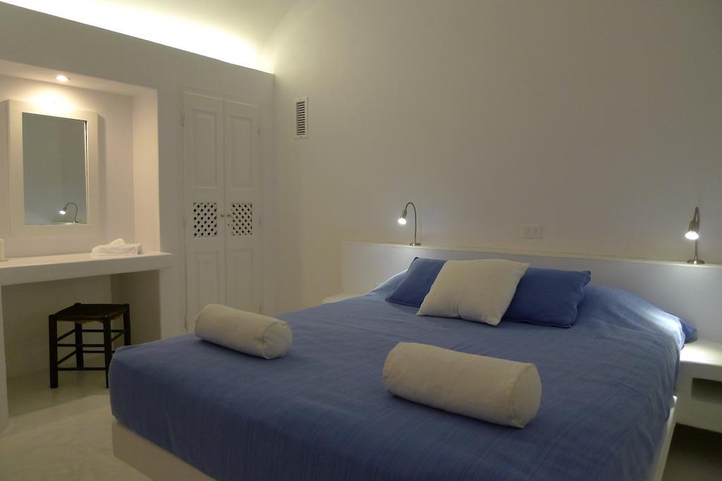 Altana Heritage Suites Imerovigli  Pokoj fotografie